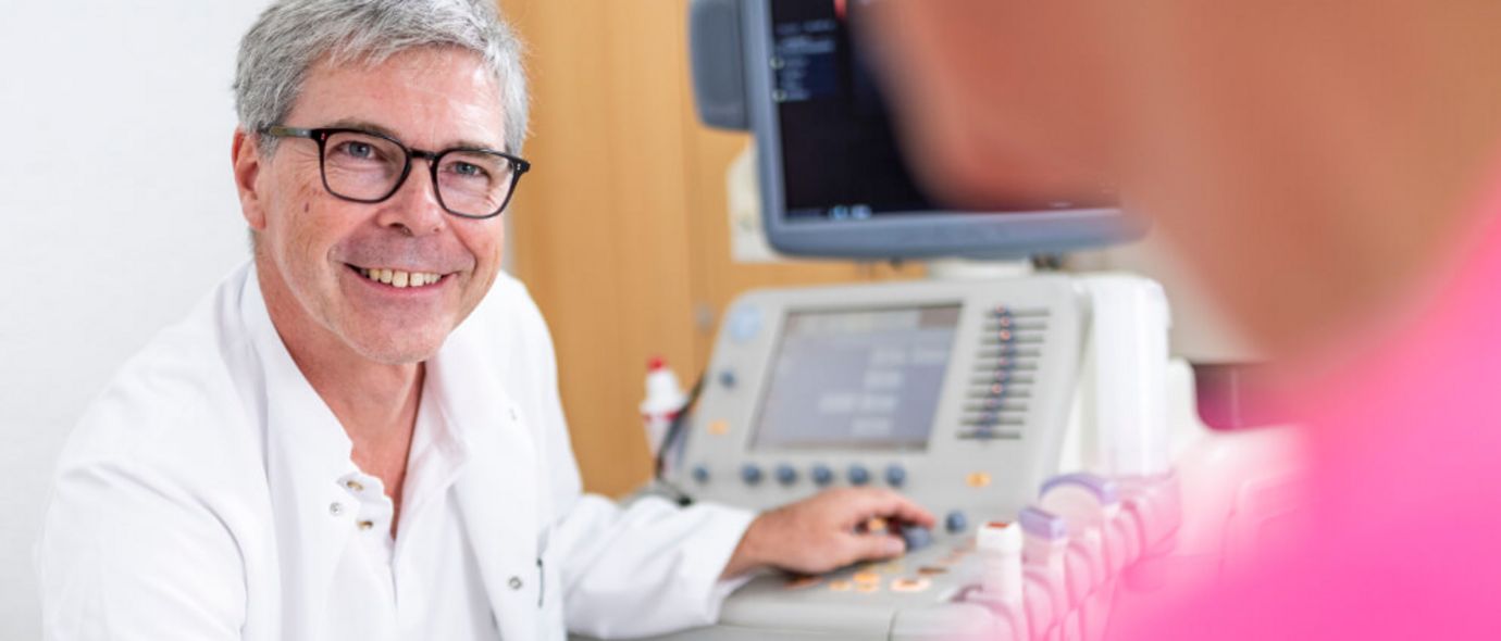 Arzt spricht mit Patienten