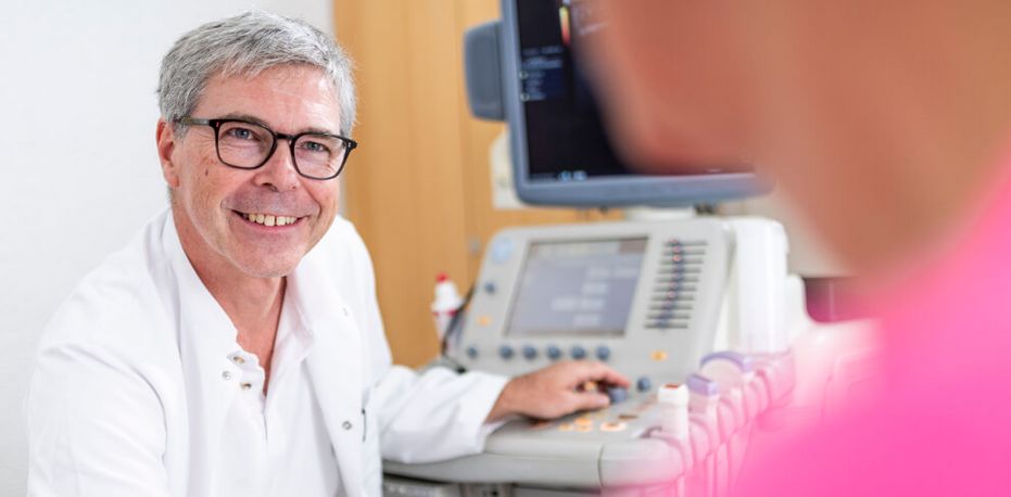 Arzt spricht mit Patienten